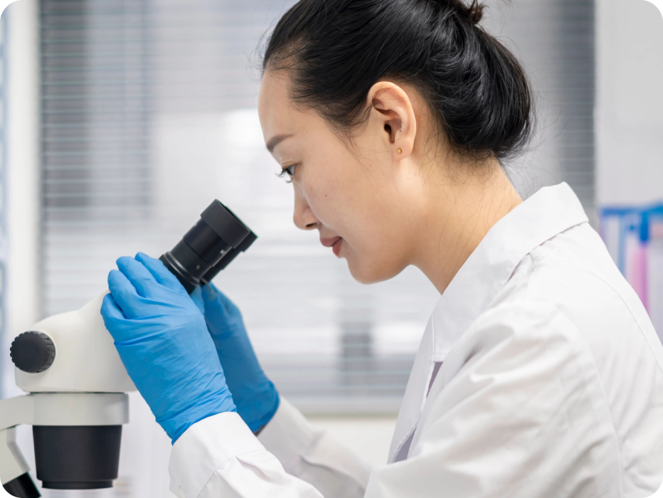 Image of a woman with a microscope